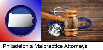 a gavel and a stethoscope in Philadelphia, PA