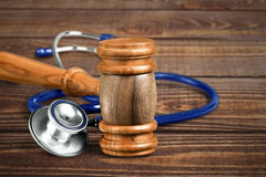 a gavel and a stethoscope
